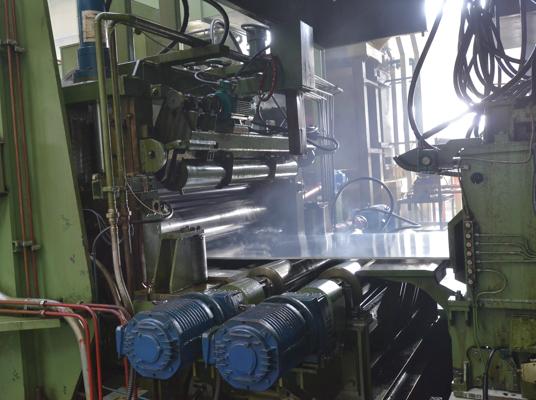 Reversing twin-coiler finishing mill