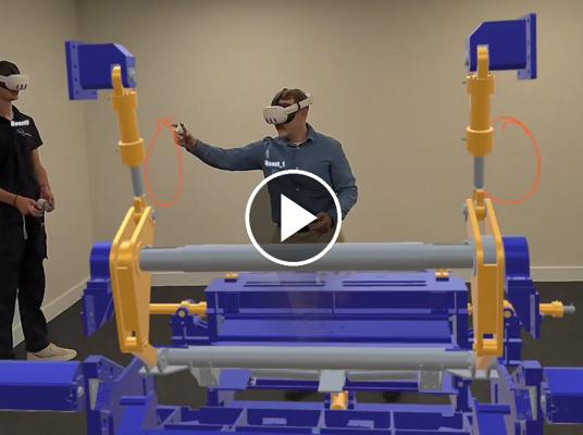 People infront of a LED wall using 3D goggles to experience Primetals Technologies fully interactive hot rolling mill in augmented reality