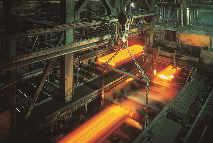 Two-strand continuous slab caster