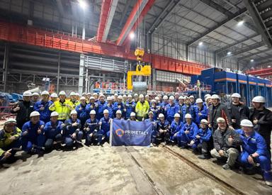 The Primetals Technologies team celebrates the first coil at Zhongshou Special Steel’s Arvedi ESP line. 