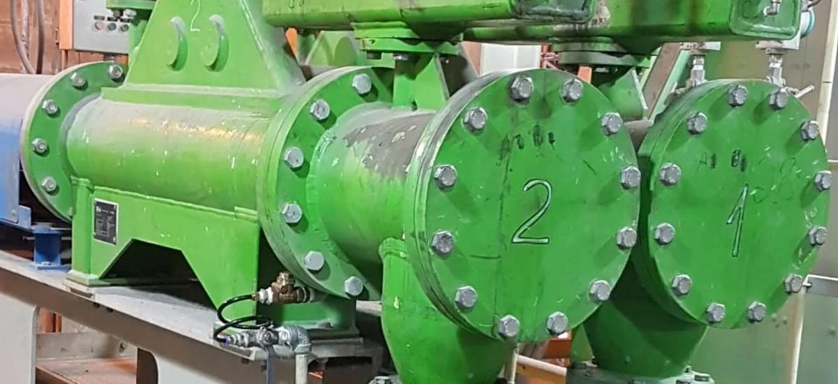 以 3 – 15 kg/min 流量精确加镁的体积计量式加料装置