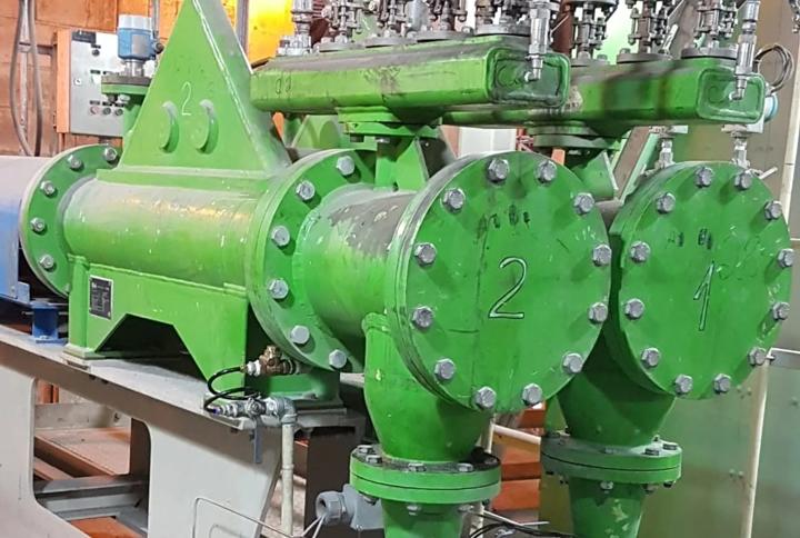 以 3 – 15 kg/min 流量精确加镁的体积计量式加料装置