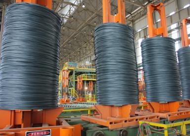 Uniform coil on vertical coil handling system ready for compacting