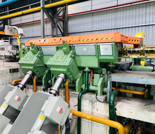 Front diagonal view of the 4-stand eDrive Morgan No-Twist Mill at a high-speed rebar mill