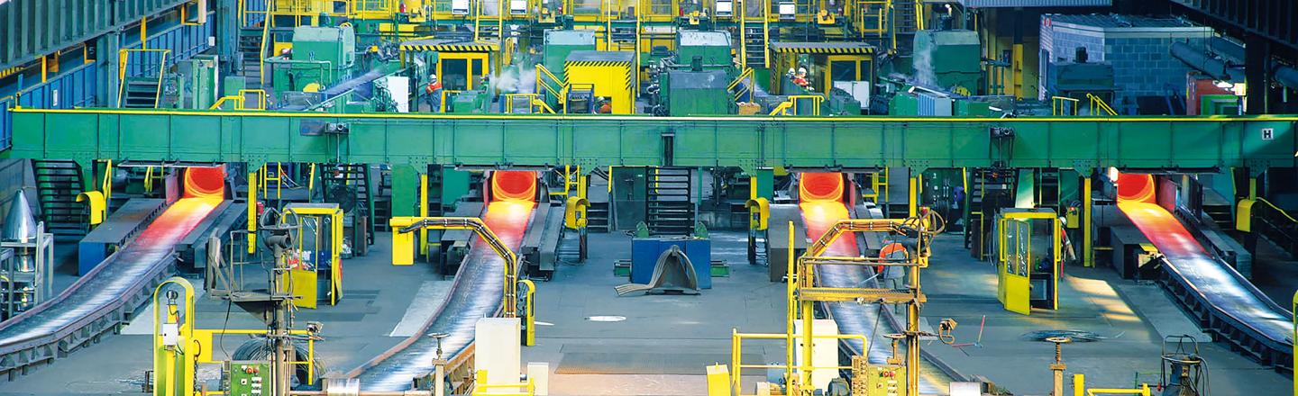 4-strand wire rod rolling mill showing hot rod exiting Laying Head onto Cooling Conveyor