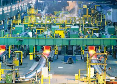 4-strand wire rod rolling mill showing hot rod exiting Laying Head onto Cooling Conveyor