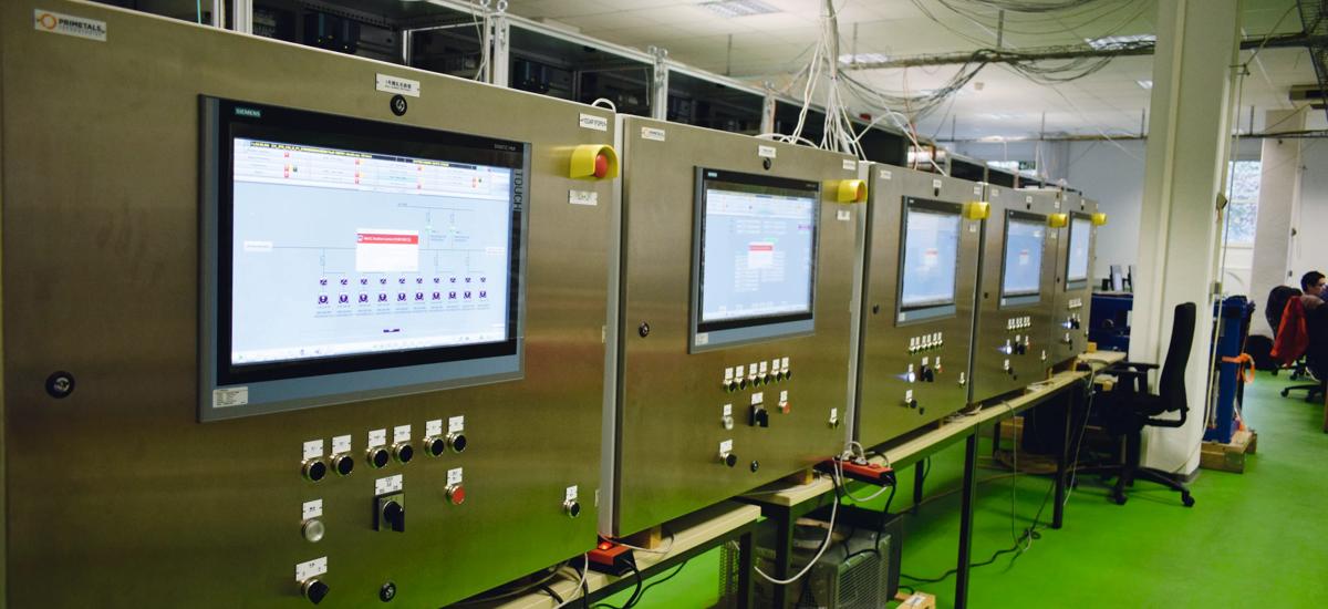 The role of the site is to test new automation equipment before it is installed in steel plants. These are control panels for the roll change in finishing mills.