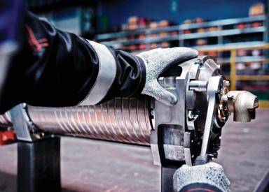 Service technician repairing a continuous caster roll