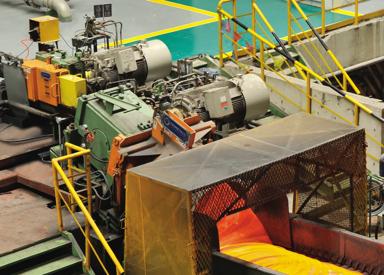 Overhead view of Primetals Technologies Pinch Roll and Laying Head in a combination stainless steel bar and wire rod mill