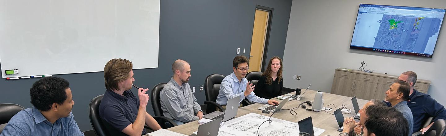 Image of a live training session featuring specialists from Primetals Technologies in a conference room 