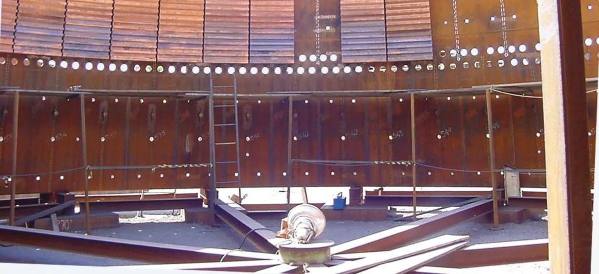 Copper staves being installed in a blast furnace shell 