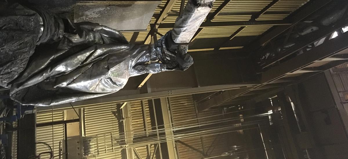 LiquiRob casting platform robot from Primetals Technologies at Deutsche Edelstahlwerke GmbH in Siegen. The LiquiRob is used there on the continuous billet caster and handles the automatic lancing of the ladles (Image courtesy DEW).