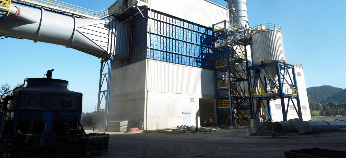 Bag filter with clean gas stack and dust silo at Acroni