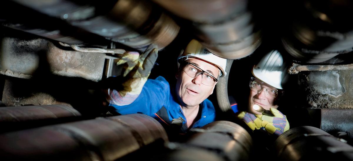 Photo of technicians inspecting a slab caster segment