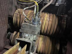 A photo showing the Advanced Roller Guides mounted with standard guide mounting saddles and require no restbar modifications.