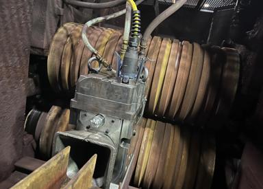 A photo showing the Advanced Roller Guides mounted with standard guide mounting saddles and require no restbar modifications.