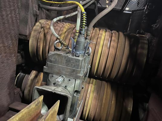 A photo showing the Advanced Roller Guides mounted with standard guide mounting saddles and require no restbar modifications.