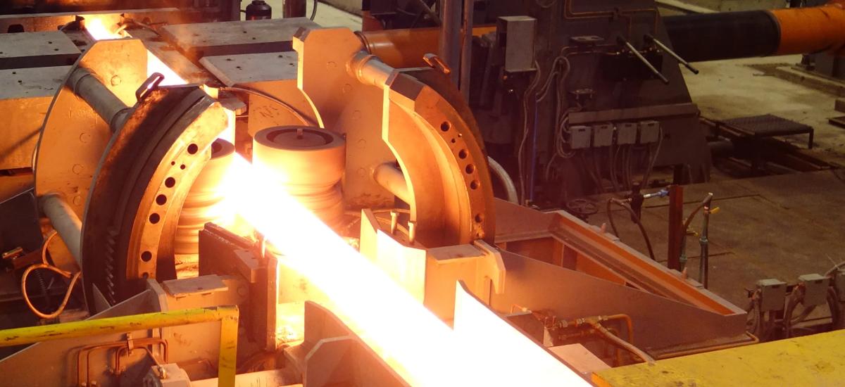 Example of an automatic bar manipulator of a section mill from Primetals Technologies.