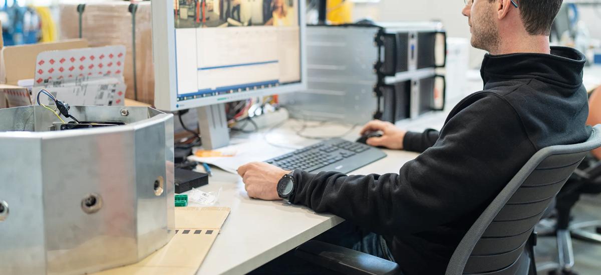 Pfeil spends a great deal of time programming new functions on the computer and testing new sensors to further improve LiquiRob’s performance.