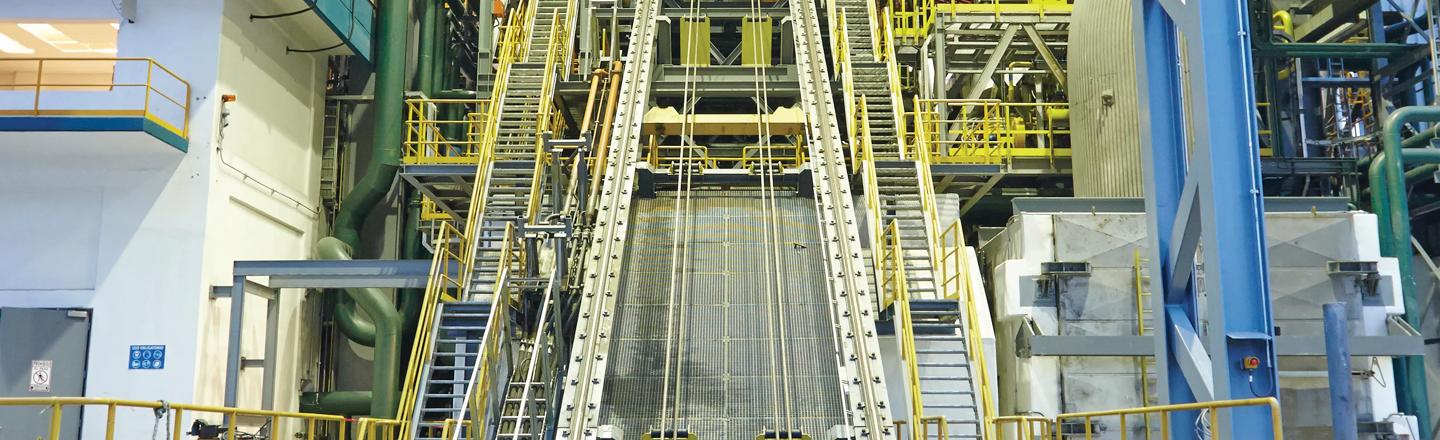 Picture of scrap on the elevator system of the EAF Quantum electric arc furnace outside the melt shop.