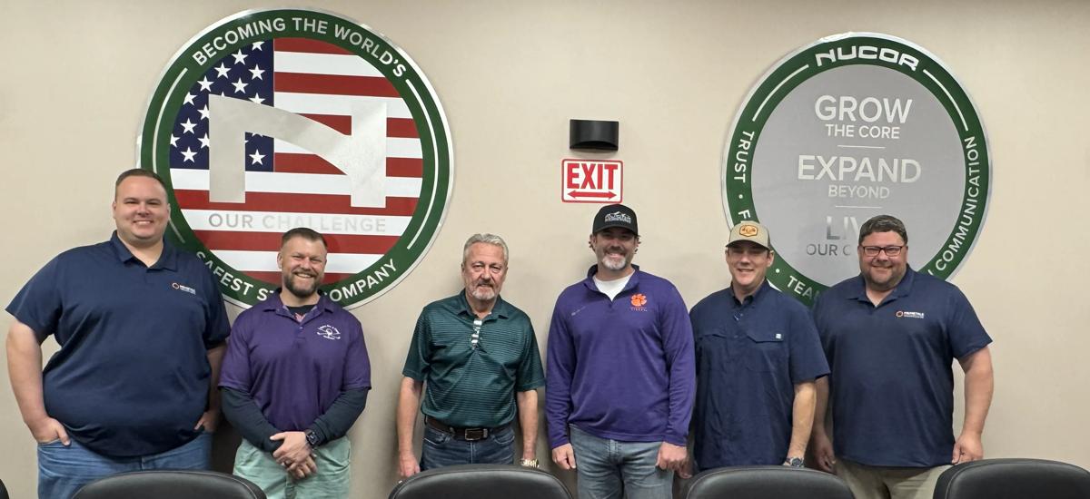 Representatives from Primetals Technologies and Nucor Decatur, from left to right: Jeremy Floyd, Senior Engineer at Primetals Technologies USA; Adam Horrex, Melt Shop Manager; Mike Jacques, Senior Business Sub-Segment Manager; JD Melton, Maintenance & Engineering Manager; Matt Brooks, General Manager — all with Nucor Decatur — and Mark Corzine, Director of Metallurgical Services at Primetals Technologies USA.