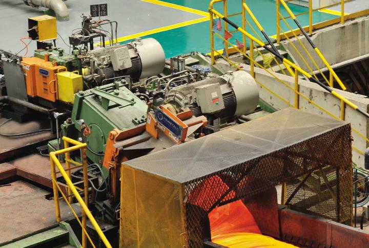 Morgan High Speed Laying Head and Morgan Stelmor cooling conveyor in a wire rod outlet.