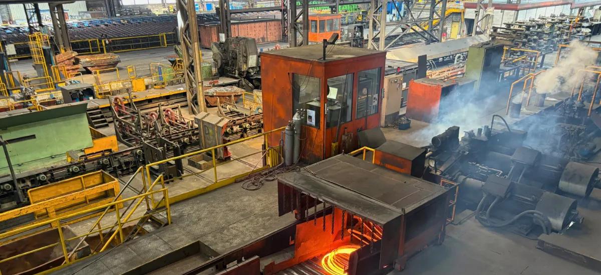 8-millimeter wire rod exiting laying head onto cooling conveyor at Stahl Gerlafingen’s new wire rod mill from Primetals Technologies. 