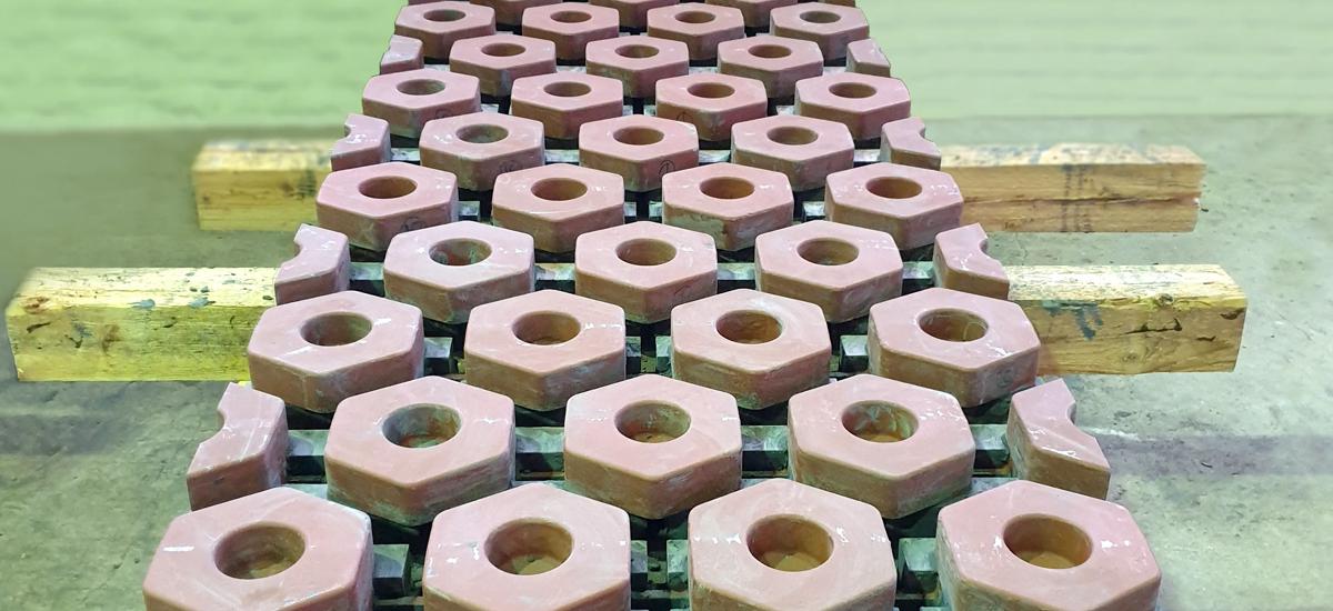 Copper staves with hexagonal inserts from Primetals Technologies ready for inspection prior to delivery.