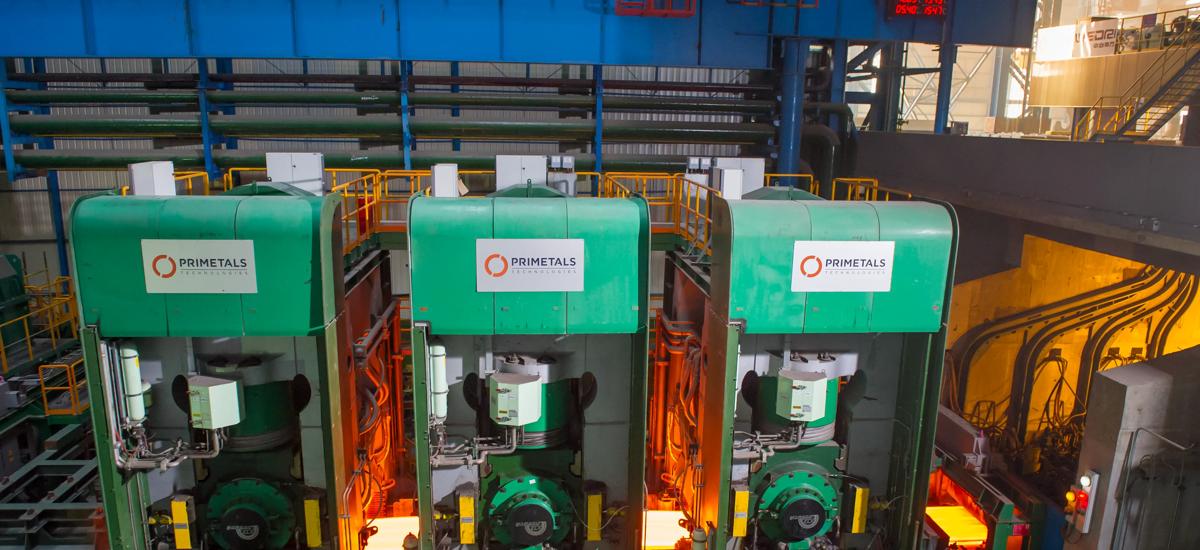 Image of the hot steel strip passing through the Arvedi ESP line