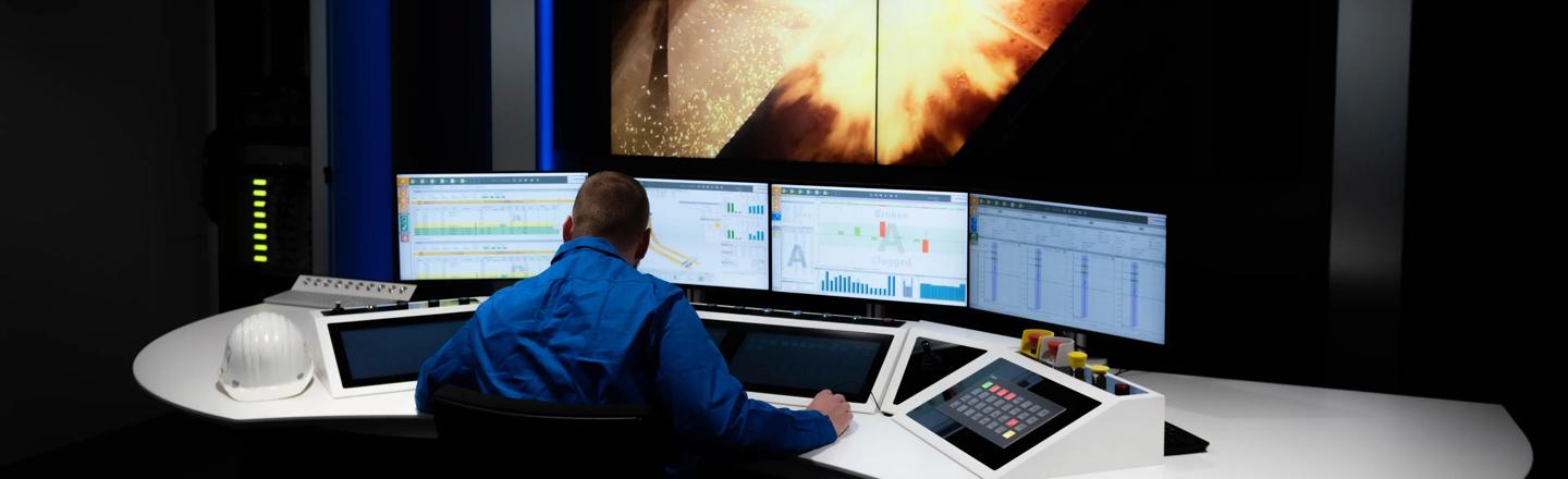 Operator sitting in virtual plant training and test center