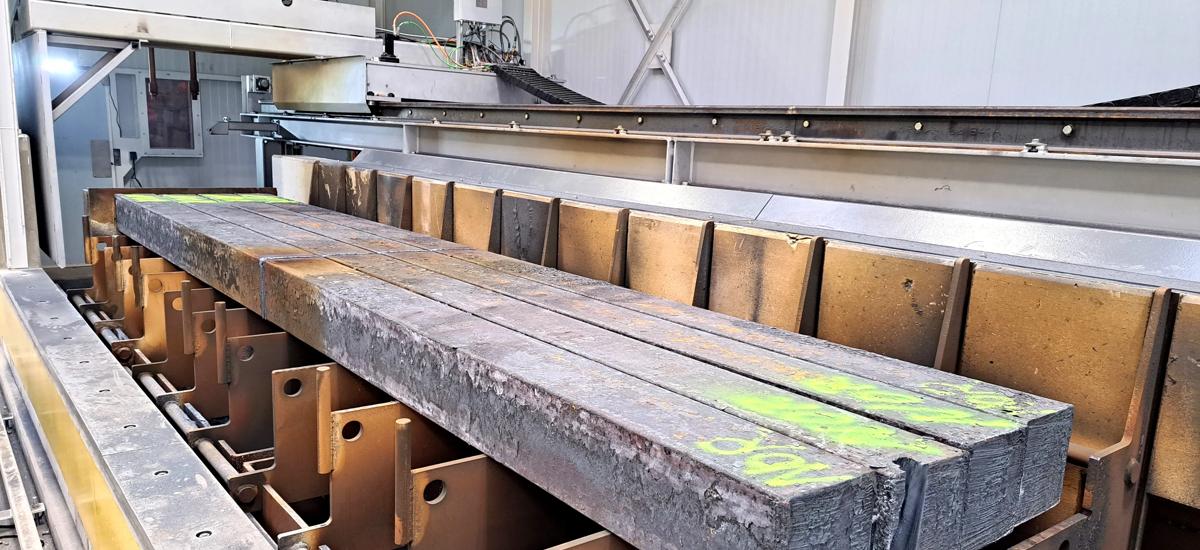 The scrap torch-cutting machine from Primetals Technologies handles various types of scrap including billets, bundles of rolled bar, ladles, and tundish scull.