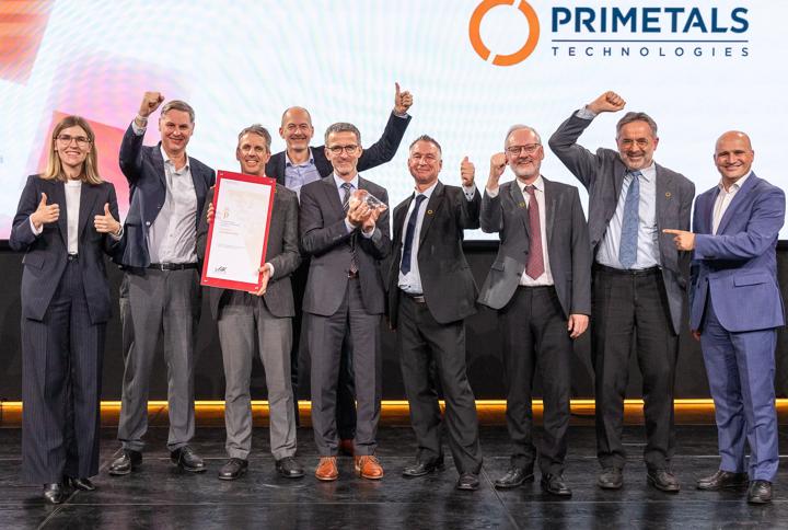 The winning team from Primetals Technologies, celebrating on stage during the ceremony for the National Prize for Innovation in Vienna. 