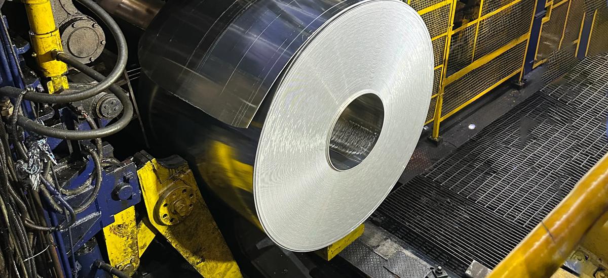 Coil being removed from the mandrel, showing clean and accurately trimmed edges