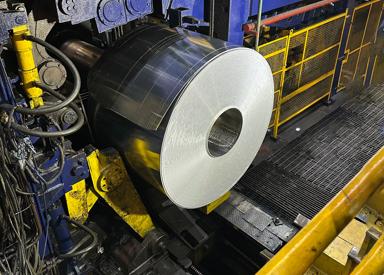 Coil being removed from the mandrel, showing clean and accurately trimmed edges