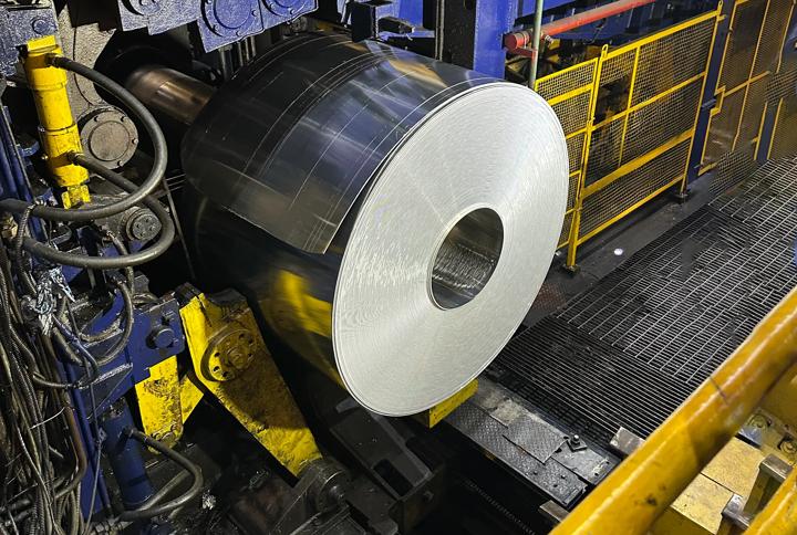 Coil being removed from the mandrel, showing clean and accurately trimmed edges