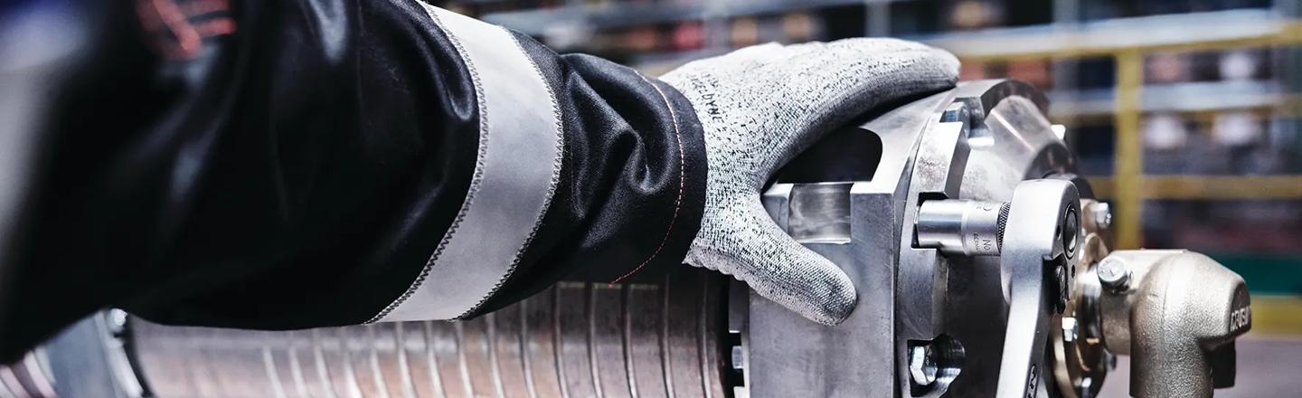 Service technician repairing a continuous caster roll