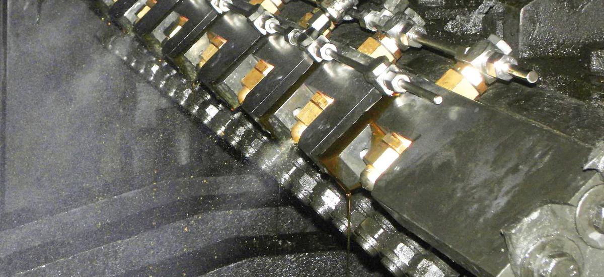 Photo of the MQL spray bar "off" at a European steel plant. 