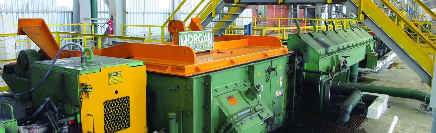 Side view of Morgan No-Twist Mill Stand with Primetals Technologies signage above