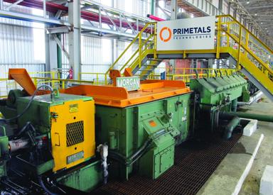 Side view of Morgan No-Twist Mill Stand with Primetals Technologies signage above
