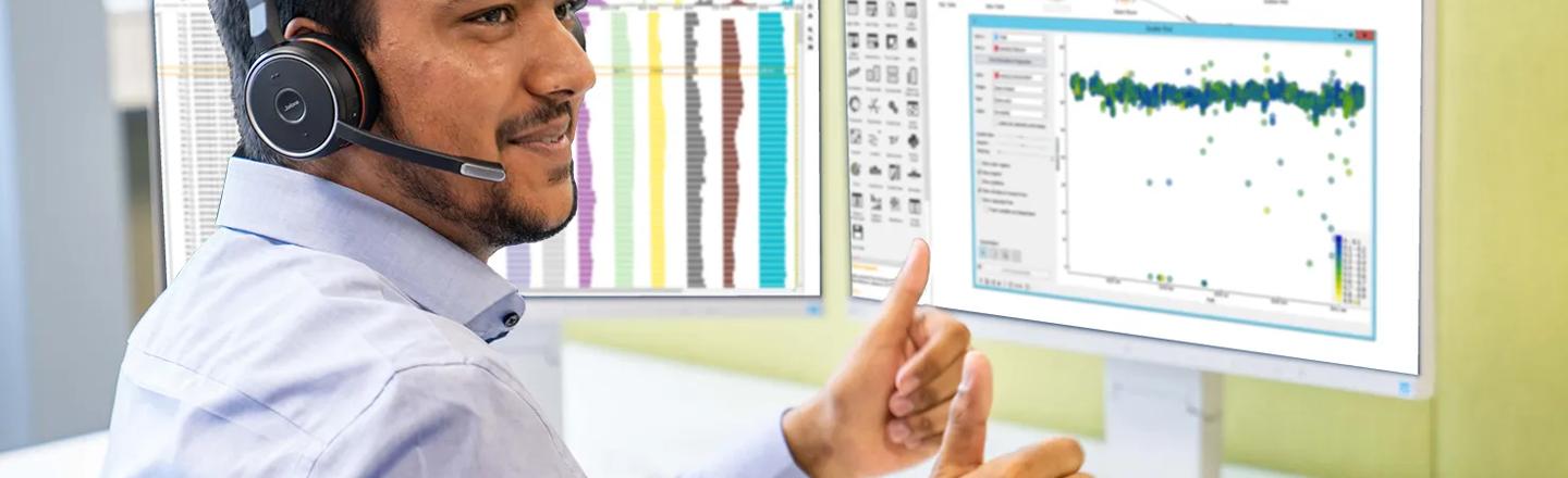 Automation expert sitting in front of screens