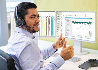 Automation expert sitting in front of screens