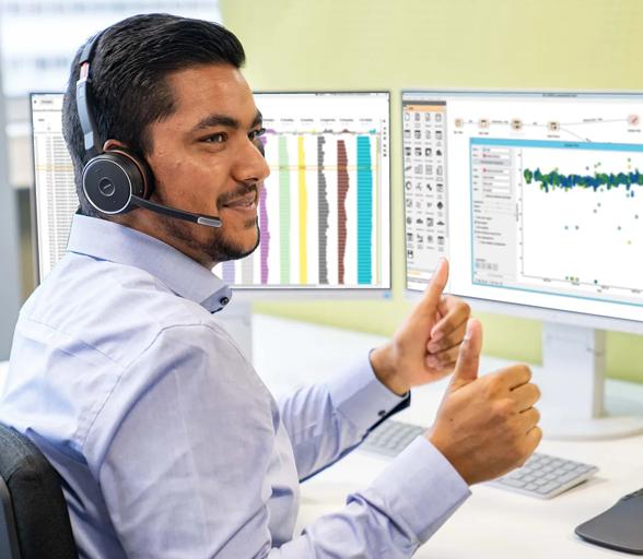 Automation expert sitting in front of screens