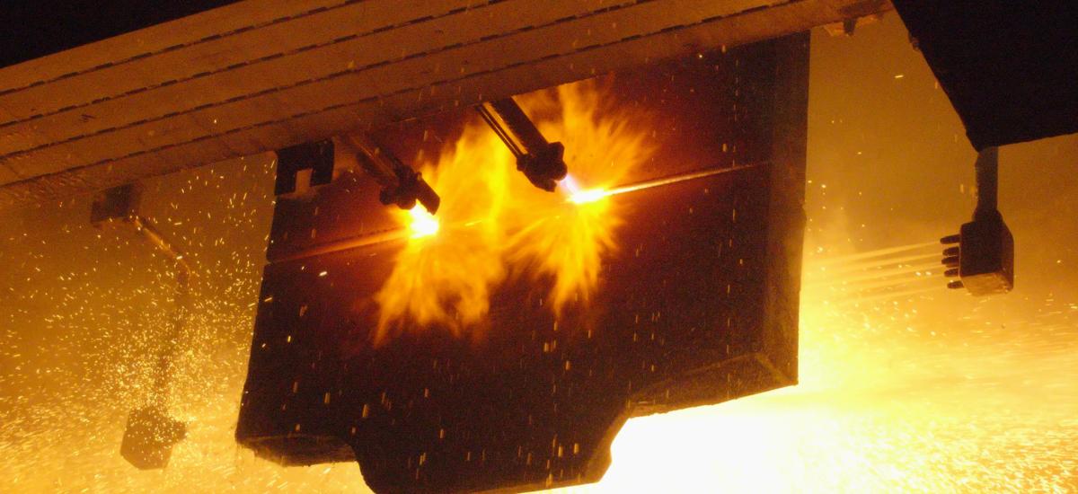 Vertical caster torch cutting