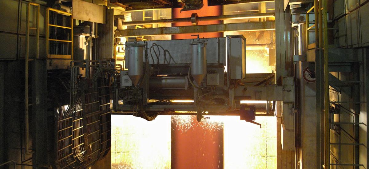 Vertical caster torch cutting