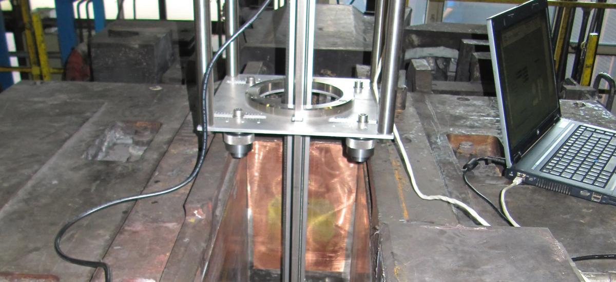 Photo of the Primetals Technologies Mold Checker measuring the surface of the mold coppers
