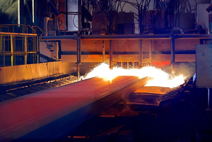 Torch cutting at a Primetals Technologies stainless steel caster