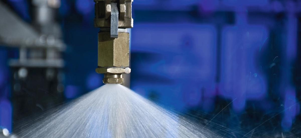 Close-up image of a spray nozzle for cooling in continuous casting at a test facility