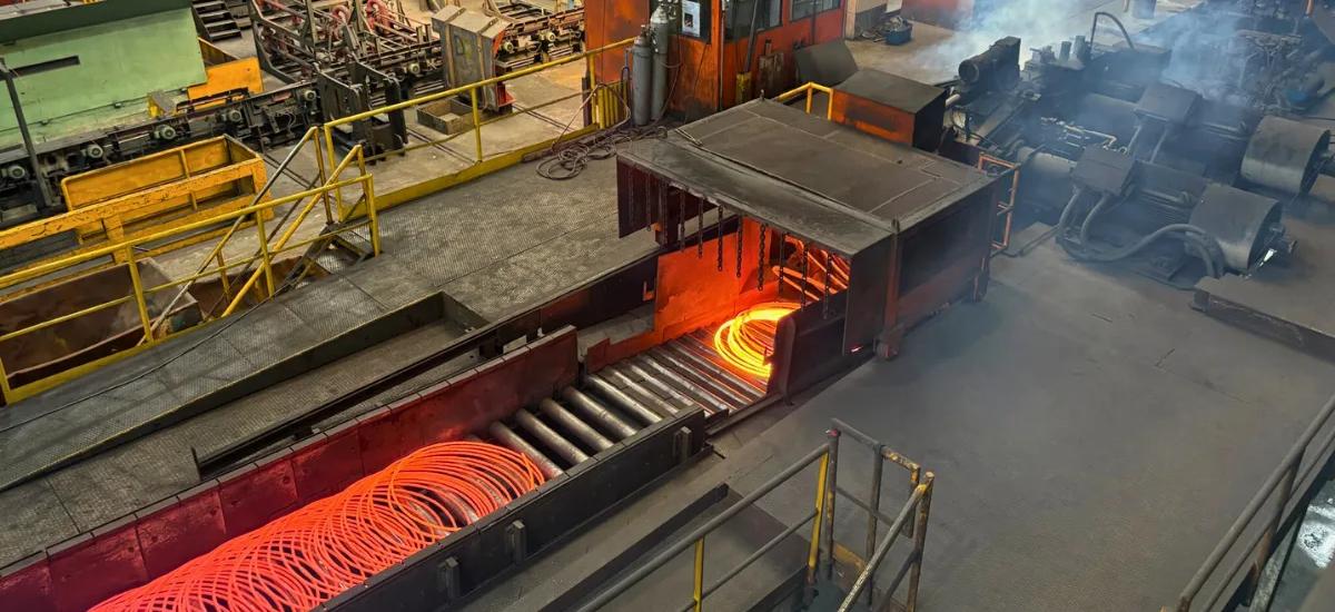 Image of Overhead view of 8 millimeter wire rod exiting upgraded Morgan Laying Head