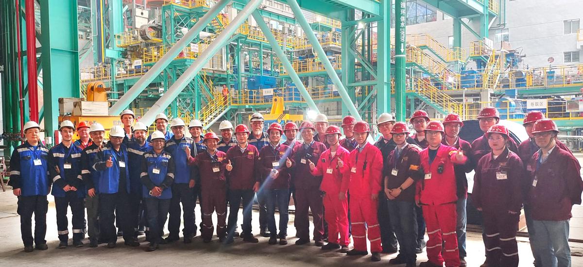 The Shagang, Castrip, and Primetals Technologies teams commemorating the first coil produced on Castrip line No. 2.