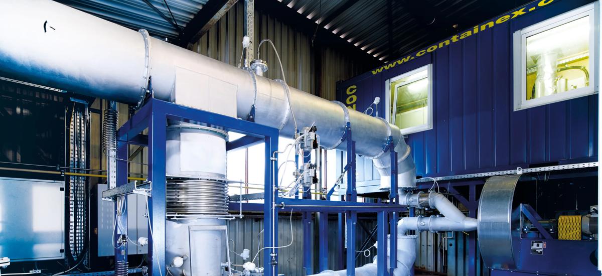 Pellet pot testing facility for grate testing, induration, design and simulation of pelletizing plant design.